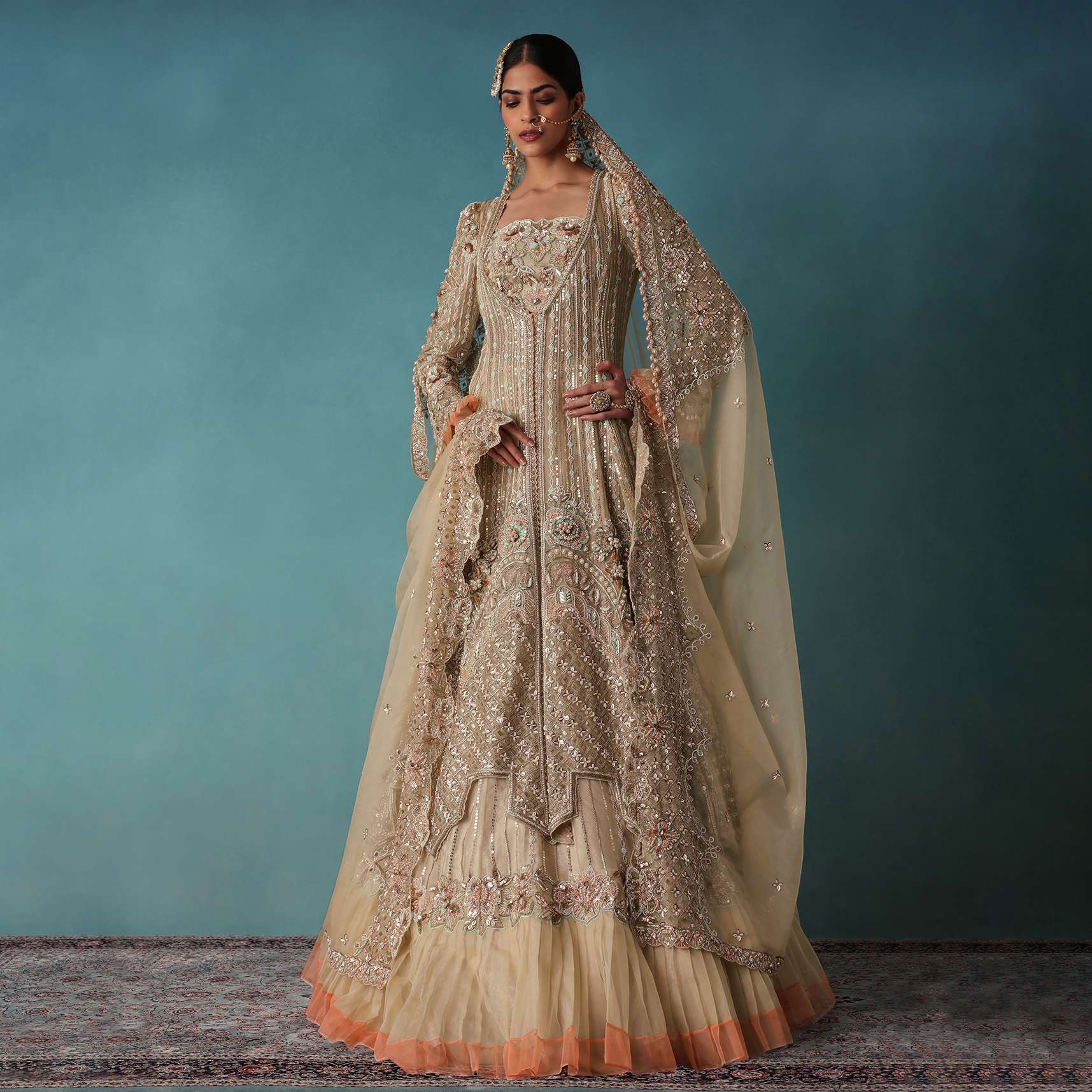 Gold Toned Embroidered Bridal Lehenga And Heavy Tube Top With Jacket