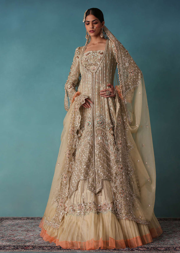 Gold Toned Embroidered Bridal Lehenga And Heavy Tube Top With Jacket