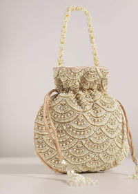 Gold Toned Embroidered Potli Bag In Raw Silk