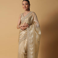 Gold Toned Foil Saree In Tissue With Cut Dana Embroidered Borders