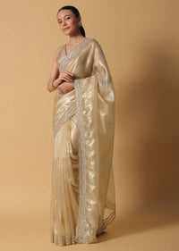 Gold Toned Foil Saree In Tissue With Cut Dana Embroidered Borders