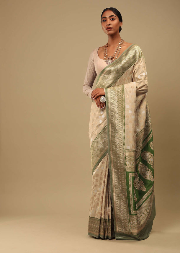 Golden Beige Saree In Art Handloom Silk With Green Woven Border And Two Toned Buttis Along With Unstitched Blouse