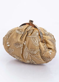 Golden clasp closure fabric clutch embellished in lace and pearl only on Kalki
