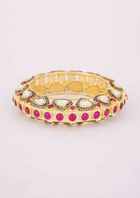 Golden cut out kundan kada adorn with kundan stone and fuchsia beads only on Kalki