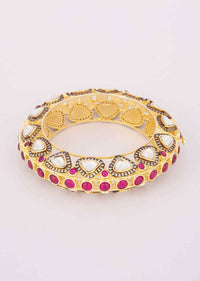 Golden cut out kundan kada adorn with kundan stone and fuchsia beads only on Kalki