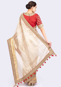 Golden Saree In Linen With Contrasting Red Brocade Silk Blouse Online - Kalki Fashion