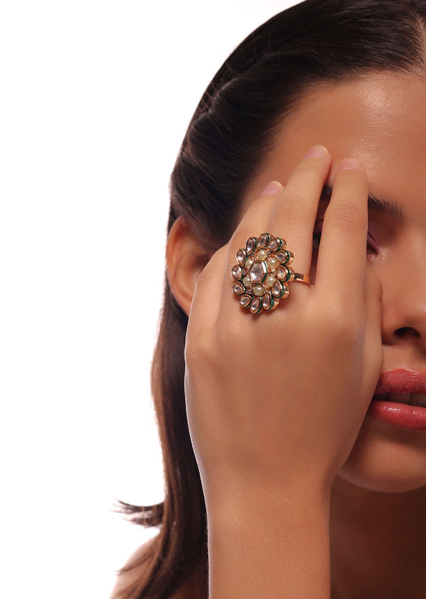 Golden Flower Shaped Ring With White Stones And Green Lining