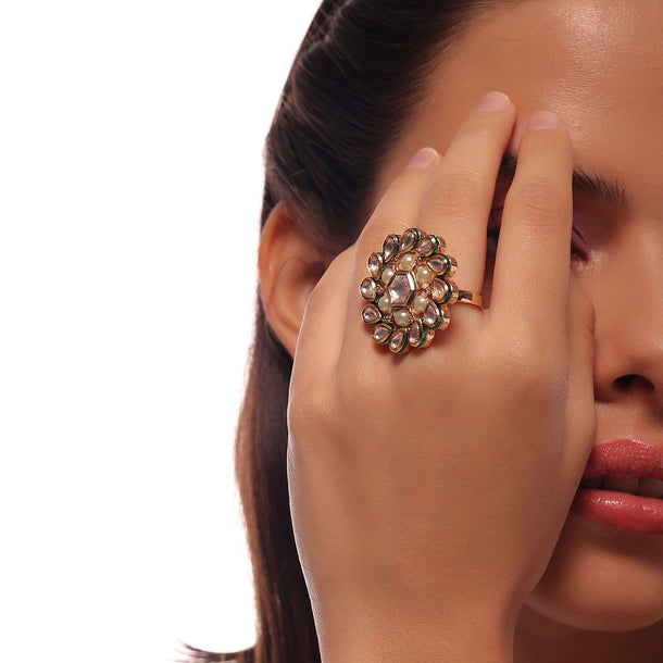 Golden Flower Shaped Ring With White Stones And Green Lining