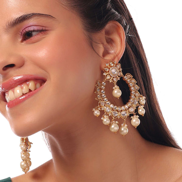 Golden Loop-Styled Earrings With Floral Design And Stone Work