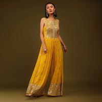 Golden Yellow Sequins Jumpsuit Sequins And Cut Dana Embroidered Buttis, Sleeveless, And Back Zip Closure.