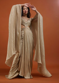 Mocha Brown Gown With A Pre-Pleated Dhoti Skirt Area And Royal Cape Sleeves- NOOR 2022