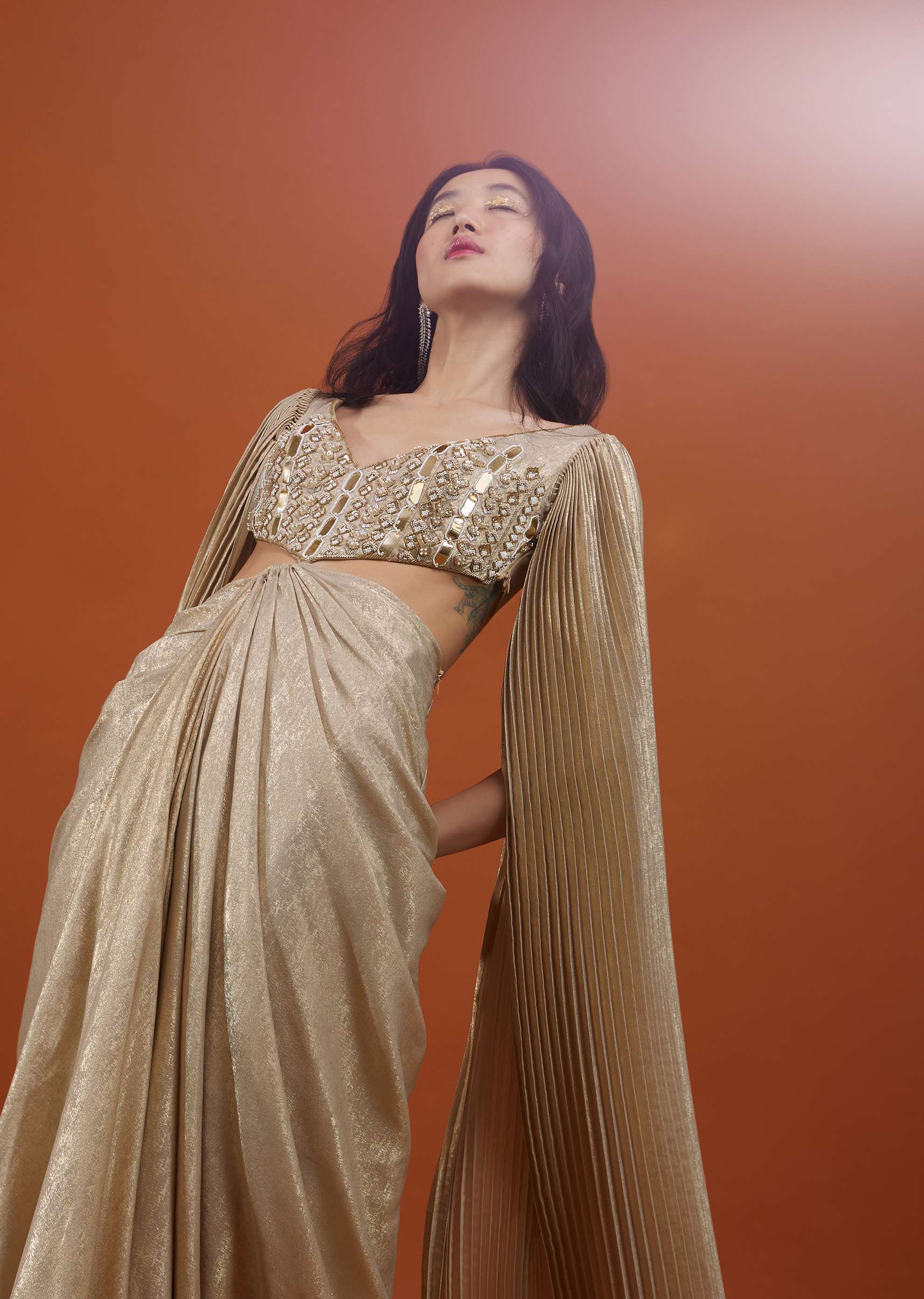 Mocha Brown Gown With A Pre-Pleated Dhoti Skirt And Royal Cape Sleeves - NOOR 2022