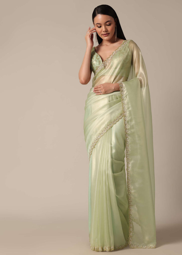 Graceful Green Saree With Scalloped Border