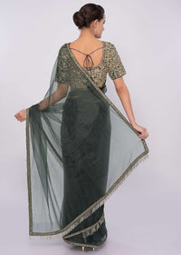 Graphite grey organza saree with tasseled pallo and border only on Kalki