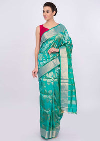 Green and blue color brocade saree only on Kalki