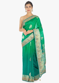 Green and blue shaded raw silk saree in weaved butti 