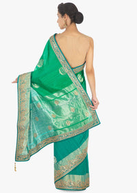 Green and blue shaded raw silk saree in weaved butti 