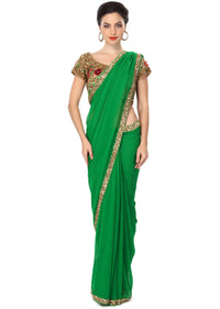 Majestic green saree embellished in sequin work only on Kalki