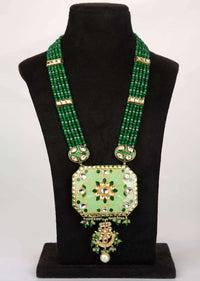 Green shaded multi string necklace with pista green pendant with meenakari work