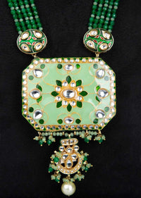 Green shaded multi string necklace with pista green pendant with meenakari work