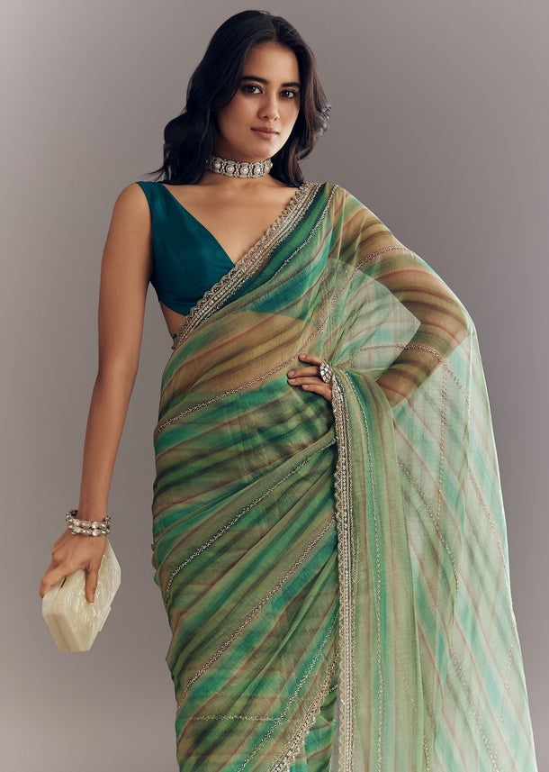 Green Shaded Tissue Saree With Cutwork Scallop Border
