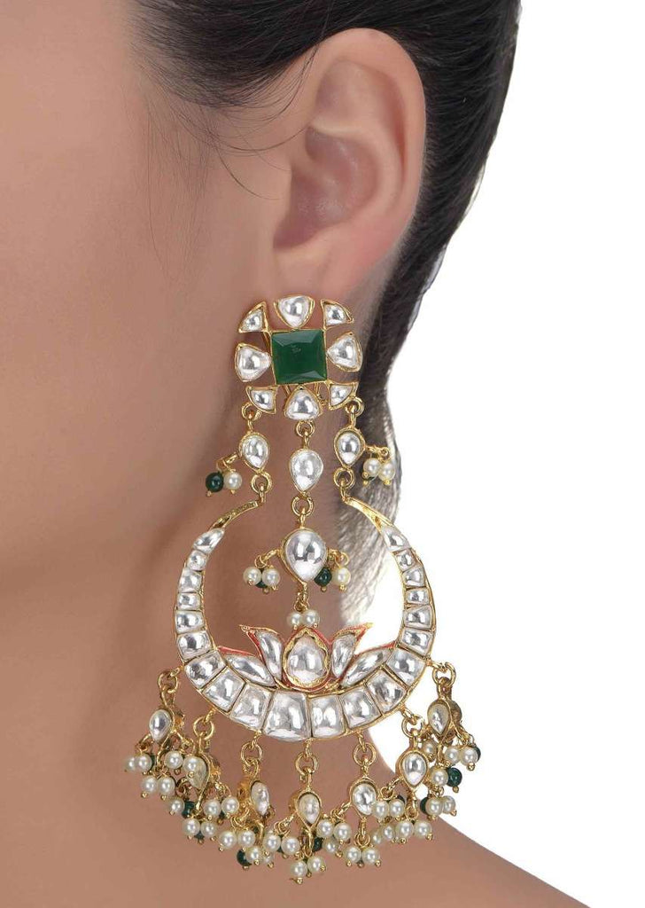 Green stone gold plated crescent danglers enhanced with kundan and pearls only on Kalki