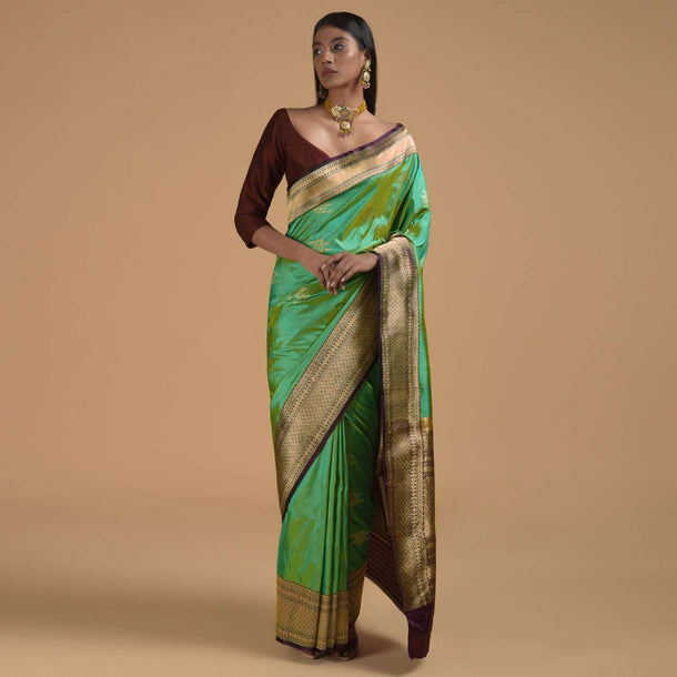 Green Two Toned Pure Handloom Saree In Silk With Woven Text Motifs And Purple Border