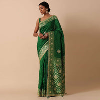 Green Banarasi Dola Silk Saree Set With Unstitched Blouse Fabric