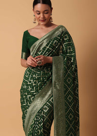 Green Banarasi Georgette Saree With Zari Bandhani Weave And Unstitched Blouse Piece