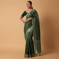 Green Banarasi Georgette Saree With Zari Bandhani Weave And Unstitched Blouse Piece