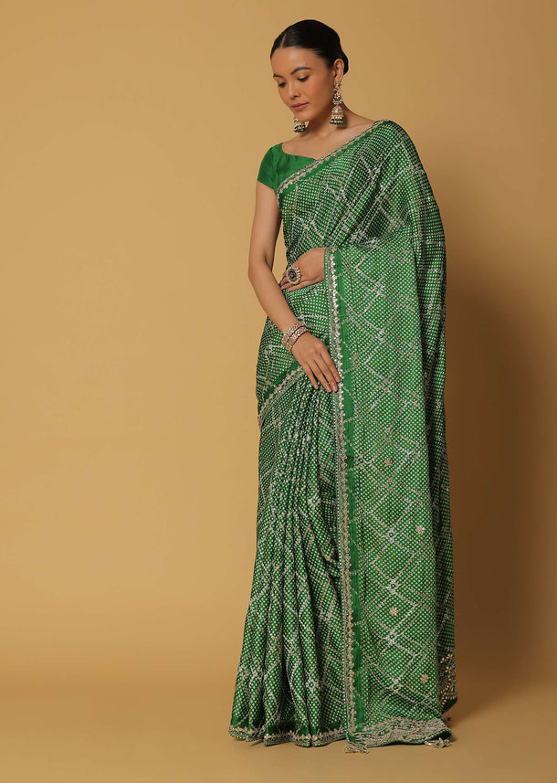 Green Dola Silk Saree With Bandhani Print And Unstitched Blouse Fabric