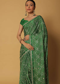 Green Dola Silk Saree With Bandhani Print And Unstitched Blouse Fabric