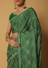 Green Dola Silk Saree With Bandhani Print And Unstitched Blouse Fabric