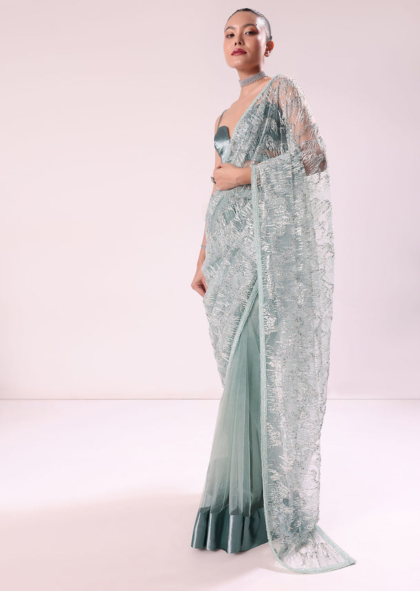 Green Fancy Sequence Net Saree With Satin Stitched And Unstitched Blouse