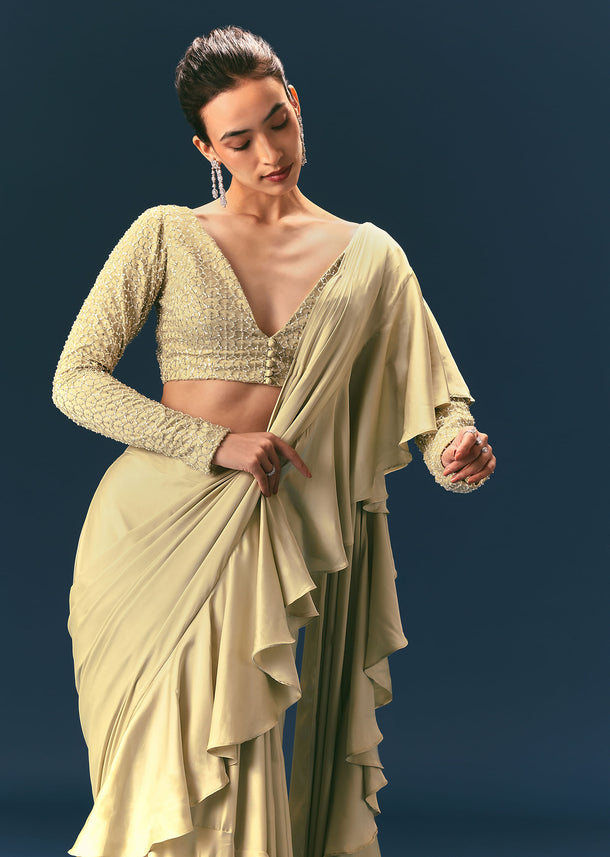 Green Frill Draped Saree With Embellished Blouse