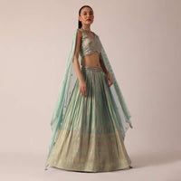 Green Lehenga Set In Brocade Silk With Floral Buttis