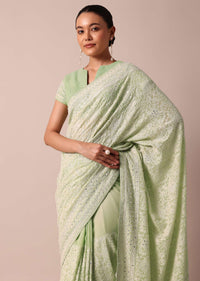 Green Lucknowi Sequin Saree With Chikankari Work And Unstitched Blouse Piece