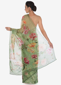 Green saree features in tissue silk with sequin embroidery only on Kalki