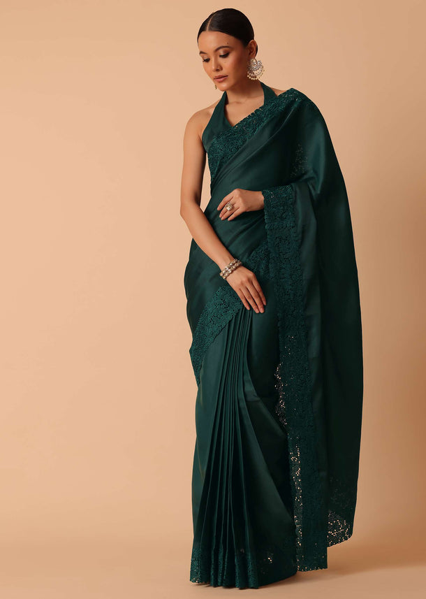 Green Saree In Organza With Lace Border And Unstitched Blouse Piece