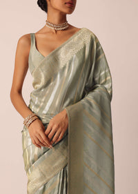 Green Saree In Silk With Diagonal Stripes Pattern And Unstitched Blouse Piece