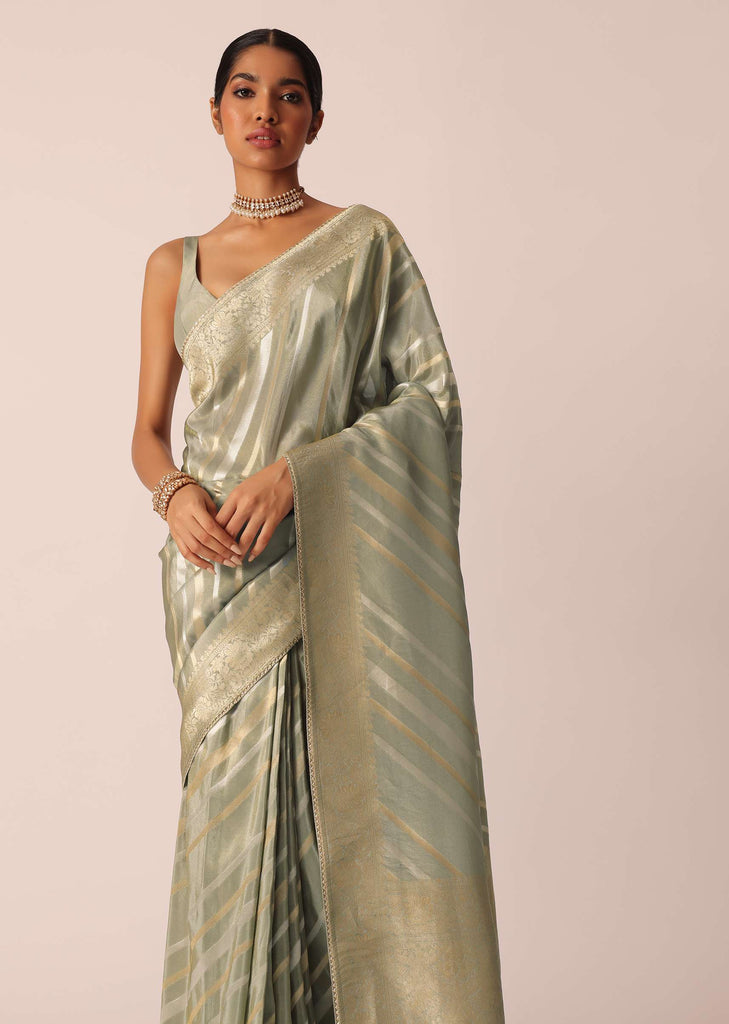 Green Saree In Silk With Diagonal Stripes Pattern And Unstitched Blouse Piece