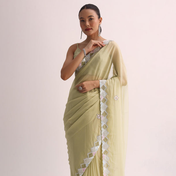 Green Saree With Embroidered Border And Unstitched Blouse
