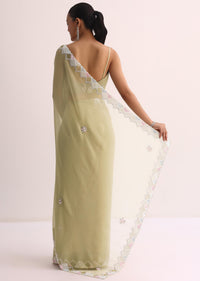 Green Saree With Embroidered Border And Unstitched Blouse