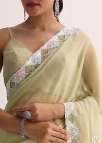 Green Saree With Embroidered Border And Unstitched Blouse