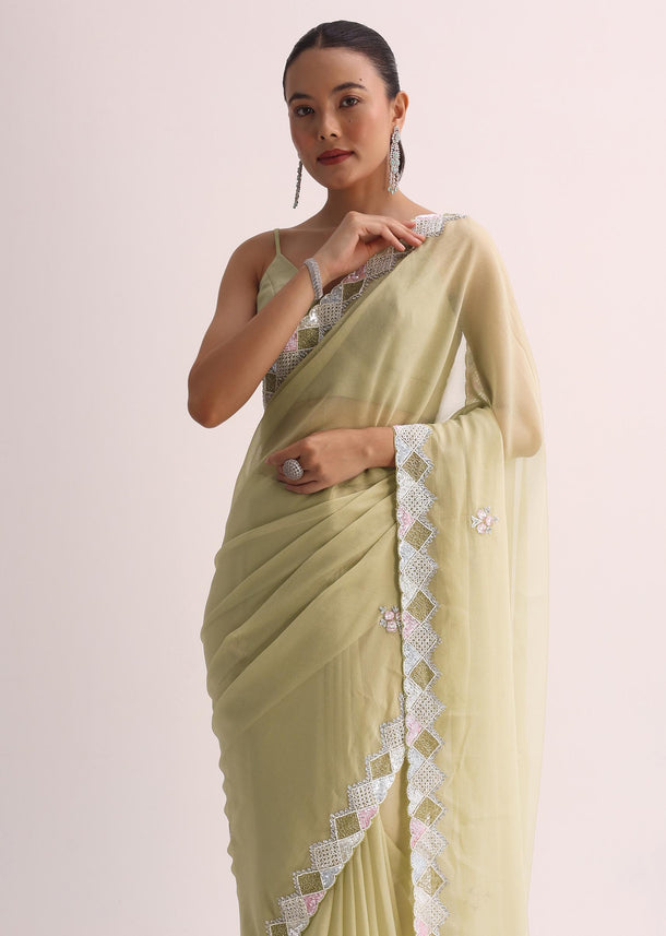 Green Saree With Embroidered Border And Unstitched Blouse