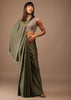 Moss Green Satin Saree With Fringes On Pallu Paired With Deep Neck Hand Embroidered Crop Top