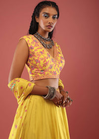 Canary Yellow Sleeveless Blouse With Colourful Stone Embellishments Paired With A Flowy Skirt