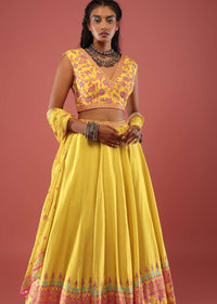 Canary Yellow Sleeveless Blouse With Colourful Stone Embellishments Paired With A Flowy Skirt