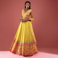 Canary Yellow Sleeveless Blouse With Colourful Stone Embellishments Paired With A Flowy Skirt