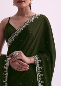 Green Stone Work Satin Saree With Cutdana Border And Unstitched Blouse Fabric